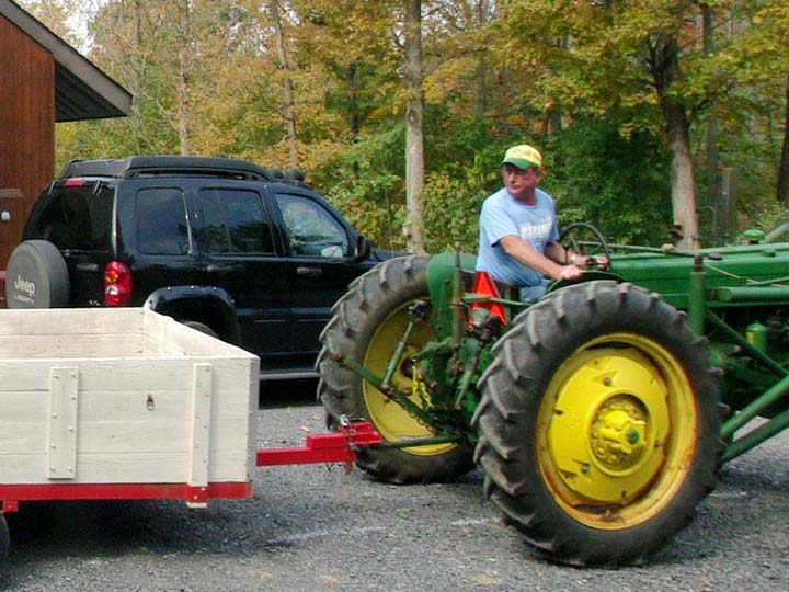Randy driving the tractor